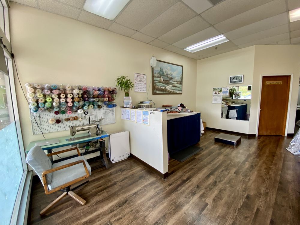 Inside #1 Tailor: sewing machine, thread wall and fitting area